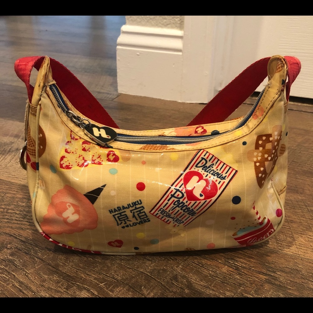Harajuku Lovers crescent shaped handbag.